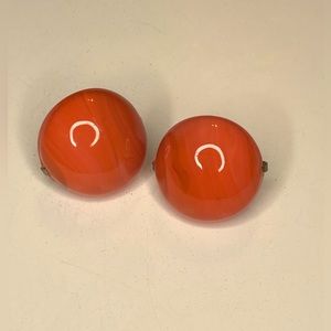 Gorgeous vintage orange swirl clip on earrings by Bergere